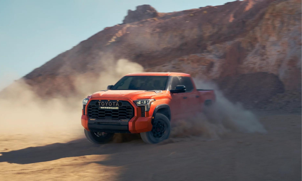 red toyota tundra 2022 on the dirt off-roading